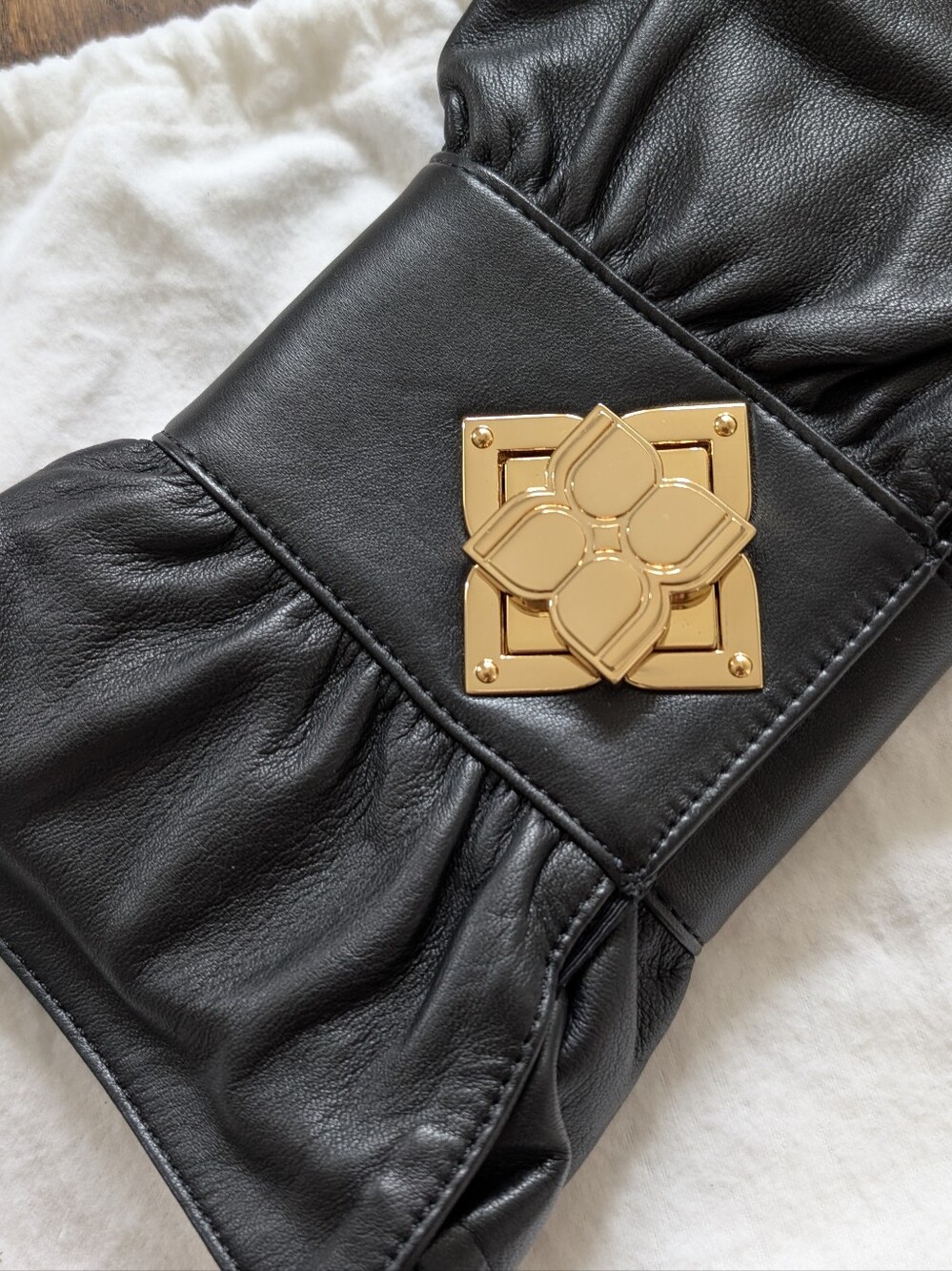 Vintage BCBG MaxAzria Black Leather Bow Clutch with Gold Floral Turnlock